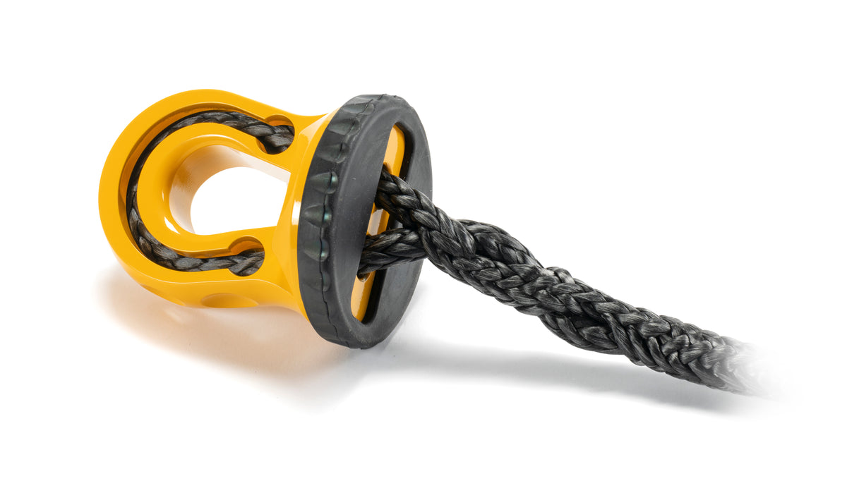 Splice on synthetic rope shackle mounting thimble with rope protection and integrated rubber pad.