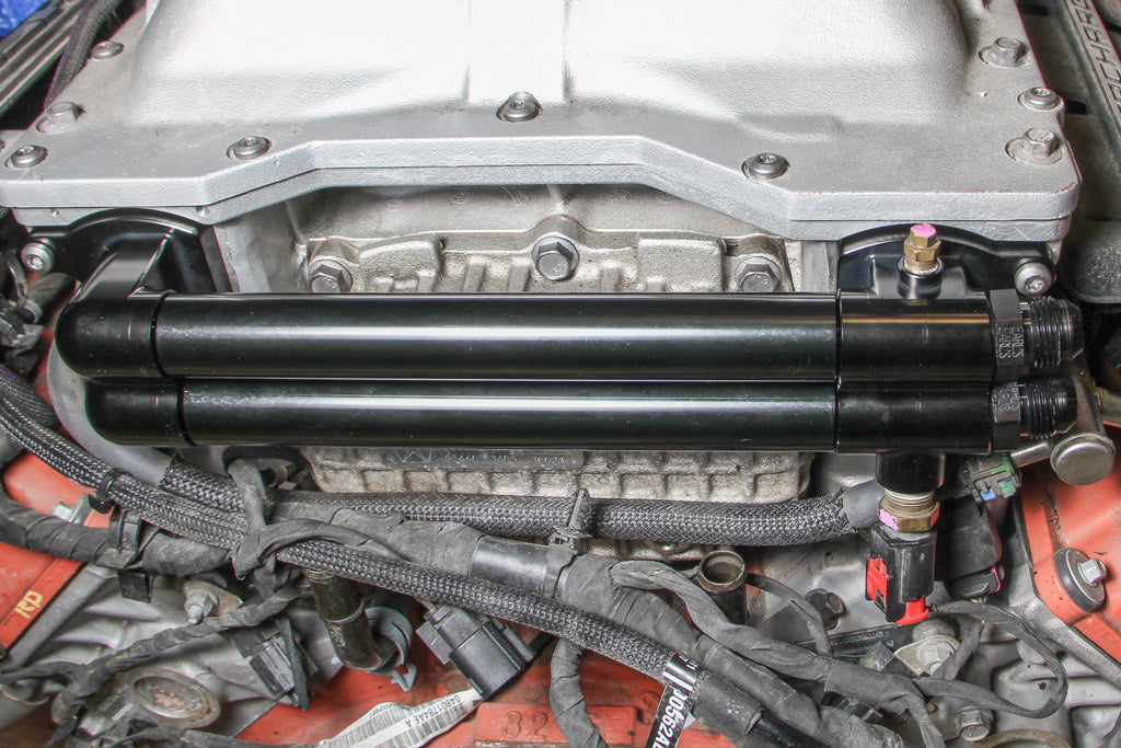 Fits 2015 & Up Gen III Hemi 6.2L Hellcat Engines.  1.875" Shorter than the factory Manifold for Extra Firewall Clearance. -10 Female O-Ring Port Inlet & Outlet.
