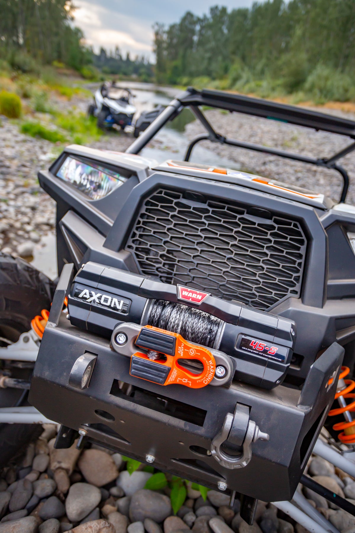 The FlatLink XTV replaces the conventional winch hook on powersports vehicles with a versatile shackle mount and stows neatly against the fairlead
