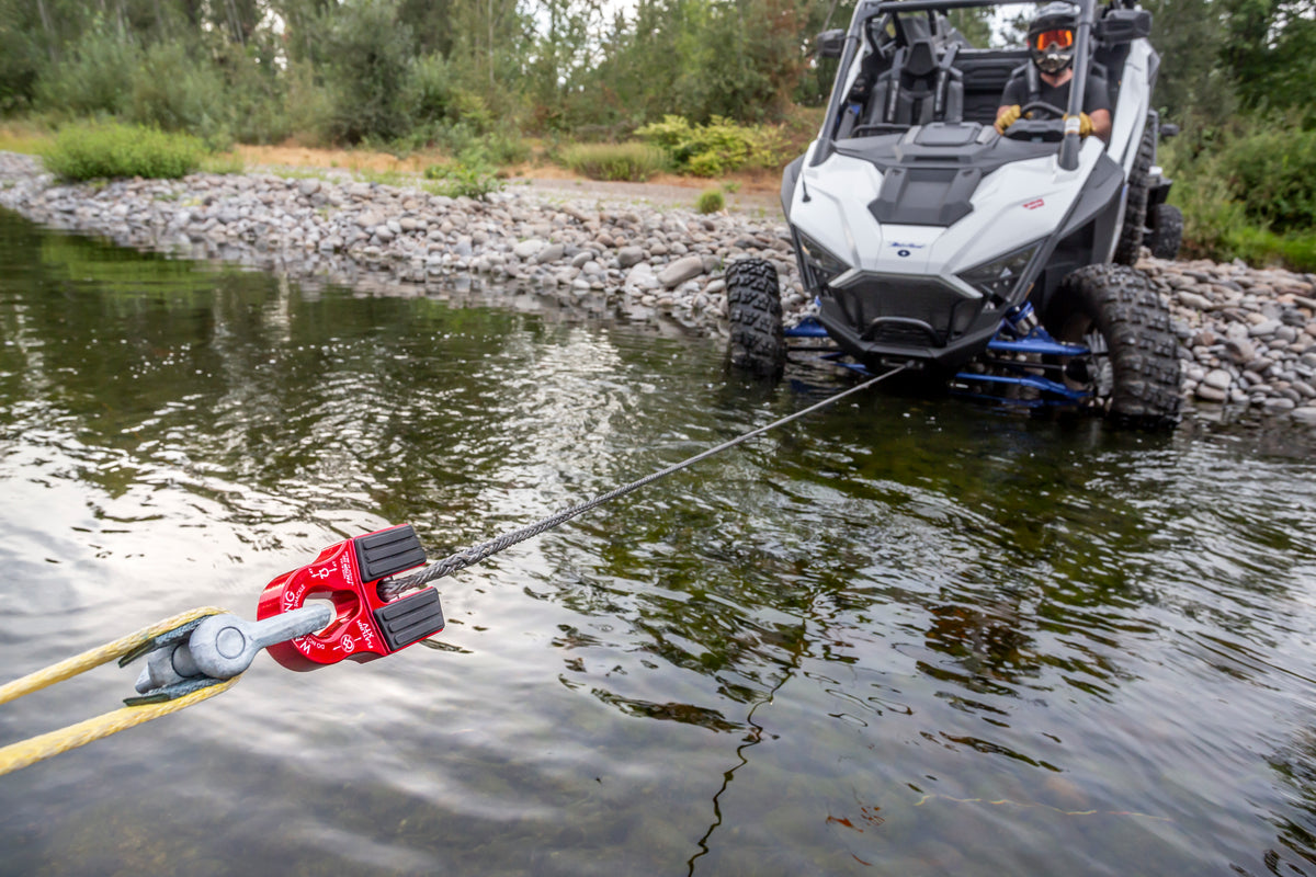 The FlatLink XTV replaces the conventional winch hook on powersports vehicles with a versatile shackle mount and stows neatly against the fairlead