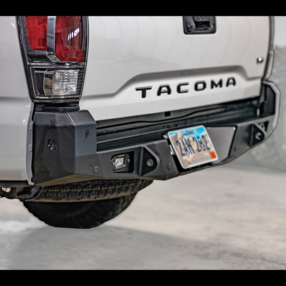 Tacoma Overland Rear Bumper / 3rd Gen / 2016-2023 / Raw (manufacturer reference photo)