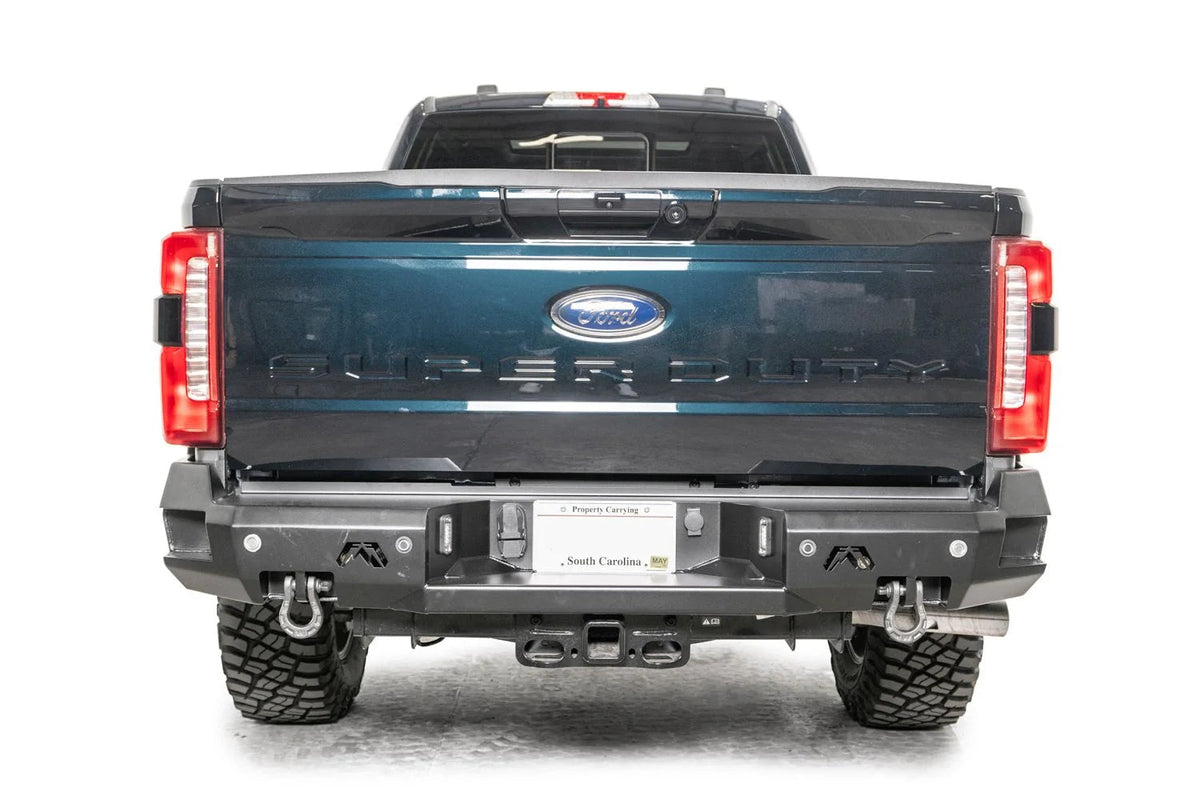 Fab Fours FS23-W5951-1 2023-2026 Rear / Yes / Powder Coat bumper; optional installed accessories shown