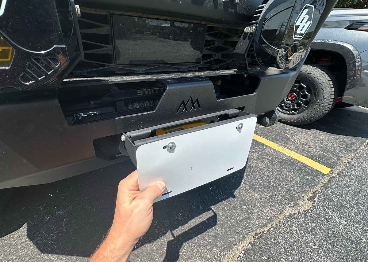 Backwoods Adventure Mods — Flip Up Front License Plate Holder - Hawse Fairlead