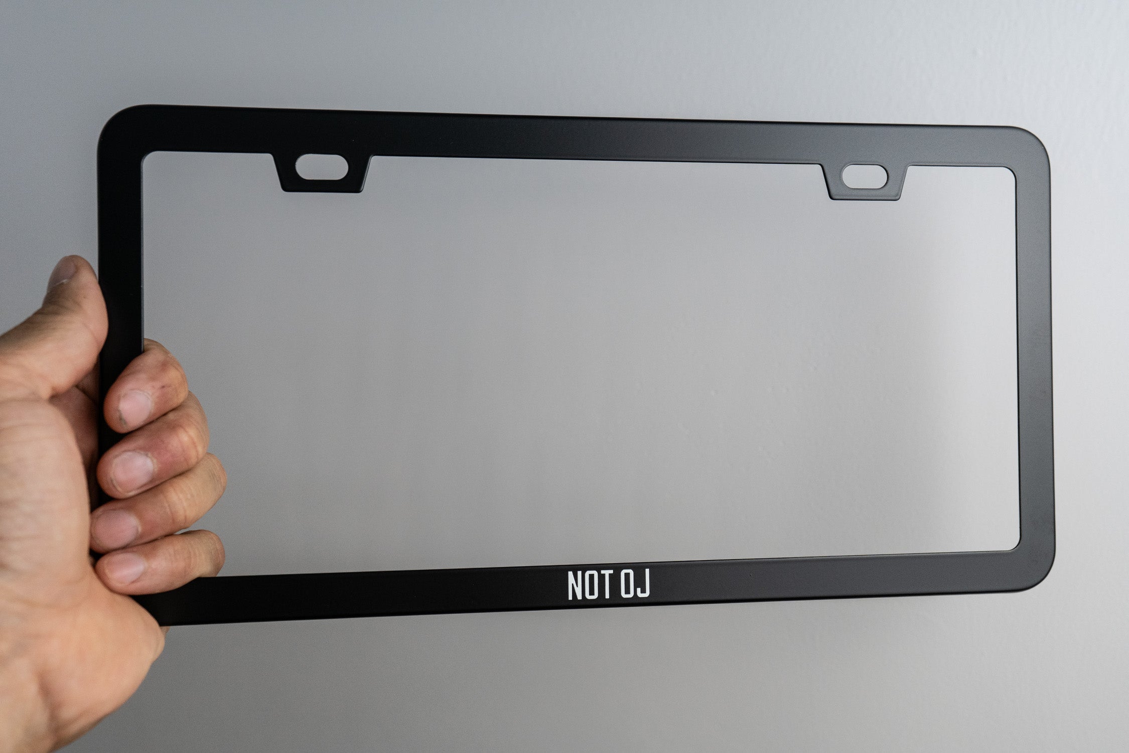 Slim "NOT OJ" License Plate Frame (Pair)